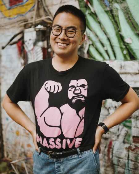 bowen standing straight with hands on his hips in a very boujee set up 